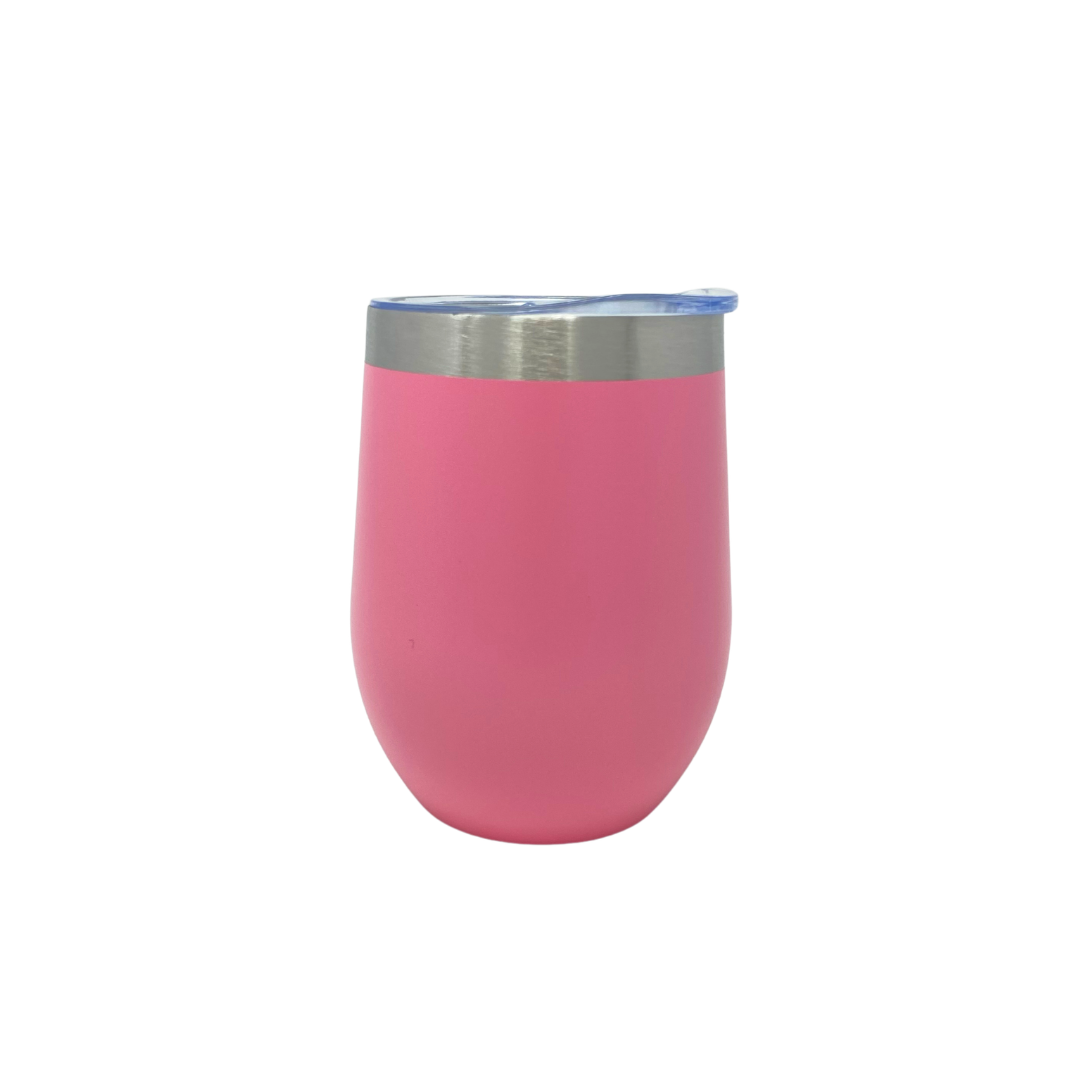 Pink tumbler with a silver rim on a white background